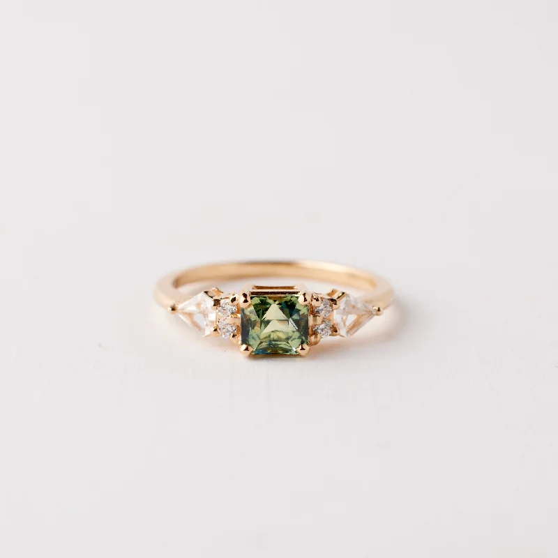 Engagement rings with tension-set peridot stones -Thursday ring - .98 Carat Yellow Teal Sapphire