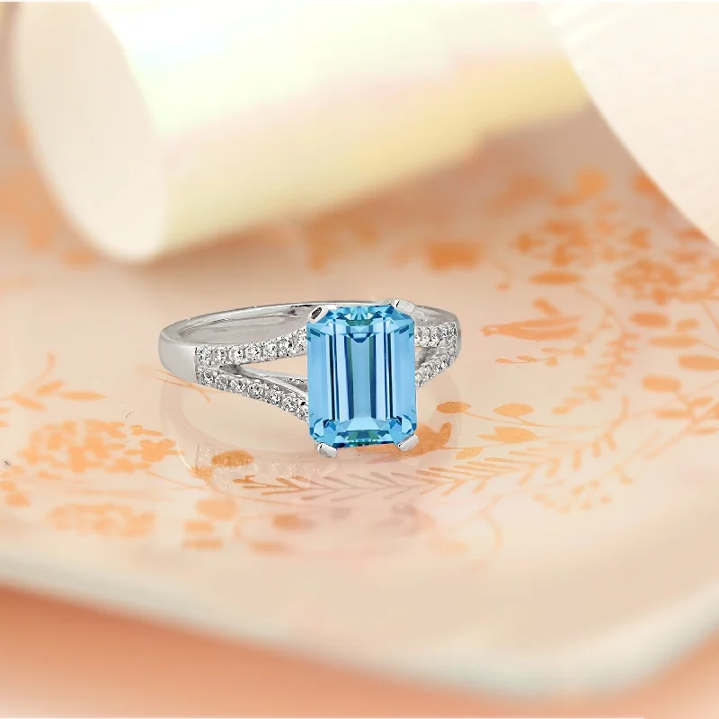 Rings with matte gold for subtle luxury -Auriya 2 1/8ct Fancy Emerald-cut Sky Blue Topaz and Diamond Engagement Ring 1/4ctw 14k Gold