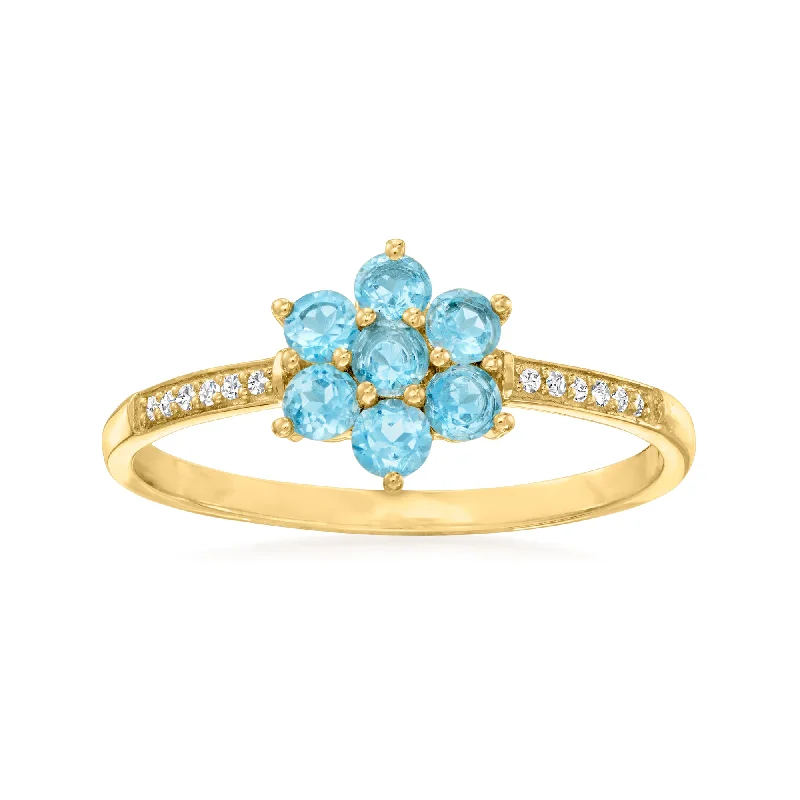 Rings with topaz stones for icy blue -Canaria Swiss Blue Topaz Flower Ring With Diamond Accents in 10kt Yellow Gold